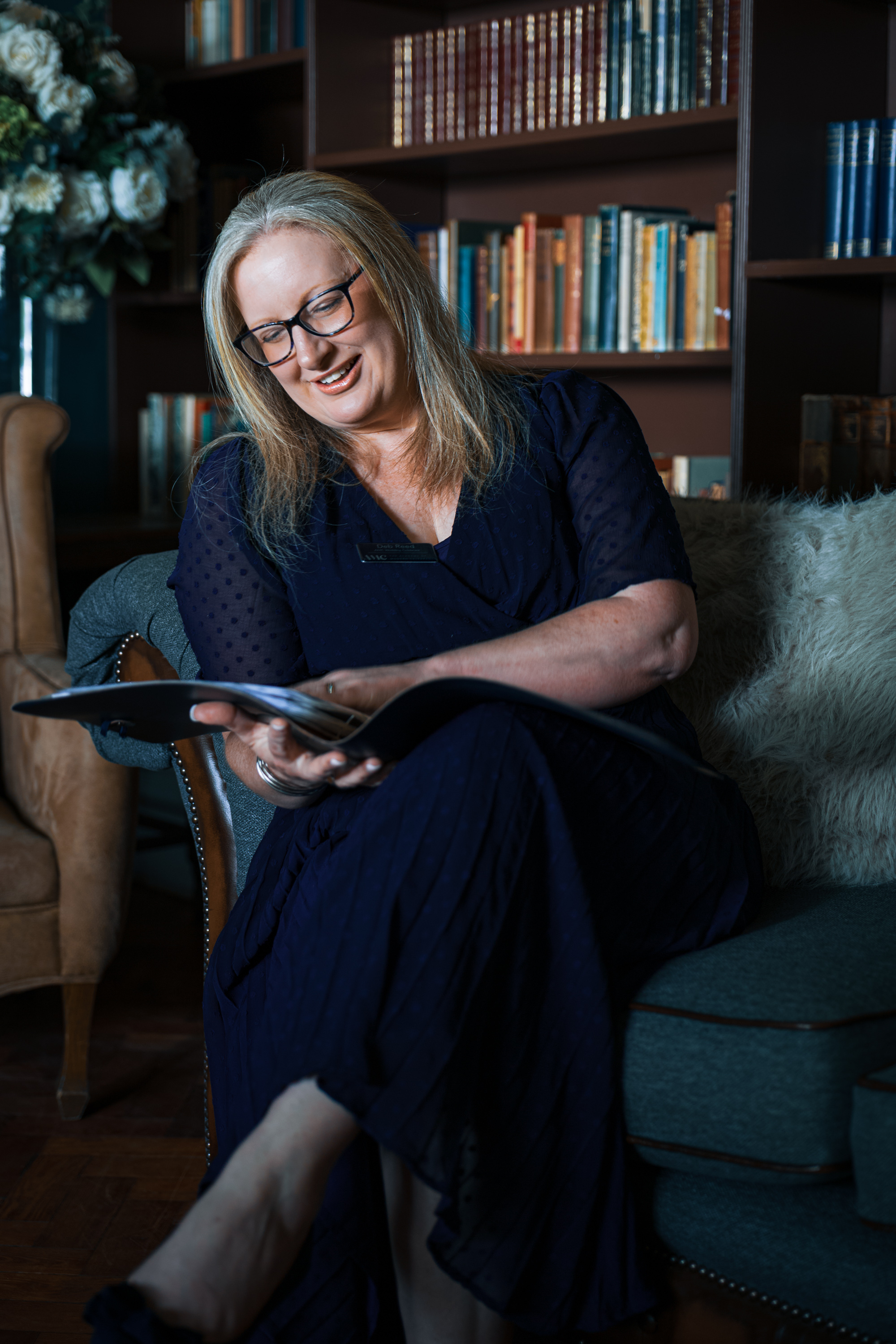 Deb Reed Celebrant Essex Colchester posing with arms out smiling.